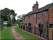 SJ8934 : Canalside cottages in Stone, Staffordshire by Roger  D Kidd