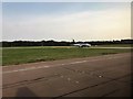 TL5322 : Aeroplane taxiing to main runway at London Stansted Airport by Richard Humphrey