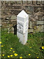 Milepost beside the Leeds and Liverpool Canal