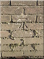 Bench mark on Laurel Cottages garden wall, Station Road