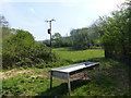 Feeding trough in a field