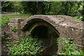 TF3093 : Utterby 14th century packhorse bridge by Chris
