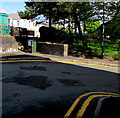 Dark green telecoms cabinet at a bend in Picton Street, Pontlottyn