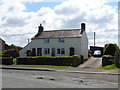 House on the A525, Eglwys Cross