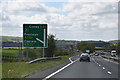 SJ1375 : Slip road and sign junction 31 by John Firth