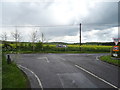 Junction of Doesgate Lane with Lower Dunton Road