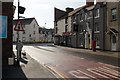 Bench marked building and The Feathers public house, Ruthin