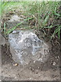 Damaged milestone in the B5126, Mold Road