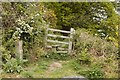 Stile at the top of a steep hill, Bodfari