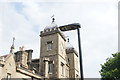 View of a lamp post and the clock tower sizing each other up in Waterman