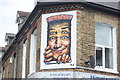 View of Sr. X street art above Himalayan Kitchen Nepalese and Indian Takeaway on Penge Lane