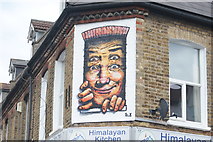 TQ3570 : View of Sr. X street art above Himalayan Kitchen Nepalese and Indian Takeaway on Penge Lane by Robert Lamb