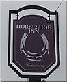 Sign for the Horseshoe Inn, Uckington