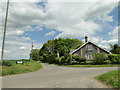 Corner Lodge with Bullockshed Lane on the left