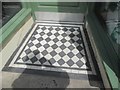 SH6266 : A tiled shop doorway on the High Street, Bethesda by Meirion
