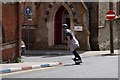 Guy on a motorised skateboard, Derry / Londonderry