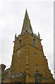 The spire on top of the tower of All Saints Church