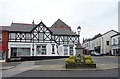 Fountain and shops, Neston