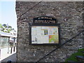 St Nicholas church name sign and information board, Looe