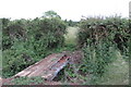 Crumbling footbridge on the path to Rectory Farm