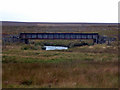 NC9945 : Railway bridge over Sleach Water by John Lucas
