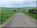 NS9237 : Minor road near to Crossridge Farm heading towards Carmichael by Peter Wood