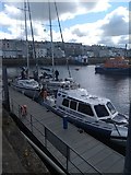C8540 : Boats in Portrush harbour by Willie Duffin
