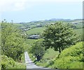 Descending Monaghan Road towards the flood plain of the White Water River