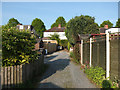 Alley running behind houses on Stockwell Drive and Stockwell Grove