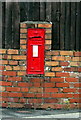 King George V postbox in a wall in the north of Caerphilly