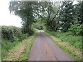 NO5647 : Narrow minor road near Smithyton by Scott Cormie