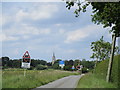 Level crossing and the spire of Asgarby church