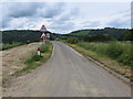 Minor road near to Mansefield approaching railway bridge and A90 road