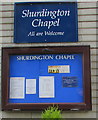 Shurdington Chapel nameboard and information board