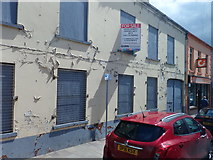 J3652 : Ripe for redevelopment - derelict properties in High Street Ballynahinch by Eric Jones