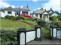 J3652 : Suburban bungalows on the A24 (Belfast Road), Ballynahinch by Eric Jones