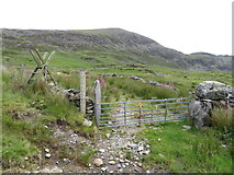 SH5545 : Gate and ladder stile near site of Treforys village by Gareth James
