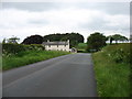 NY2243 : Approaching the A595 near Pattenfoot by David Purchase