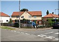 Corner property by road junction