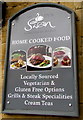 Information board on the wall of the Swan Inn, Moreton-in-Marsh