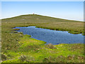 NY7130 : Small tarn on Knock Fell by Mike Quinn