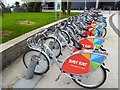 J3474 : Public bike hire docking station outside the Odyssey Centre by Oliver Dixon