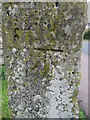 Bench mark on a defaced milestone near Coleford