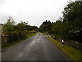 Unclassified road passes by Kinlea Wood