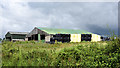 Bales beside barn at High Staples