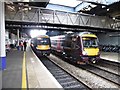 Trains pass at Cheltenham Spa