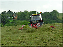 SP1967 : Tedding the grass crop near Lowsonford in Warwickshire by Roger  Kidd