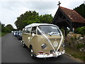 Wedding themed VW Camper Van outside Thorley Church