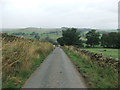 Steep descent towards Mire Close