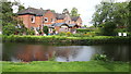 Houses in Mill Lane, seen across mill stream